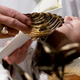 Pope Francis baptizes a baby at the Vatican, Sunday, Jan. 7, 2018. Image via AP.